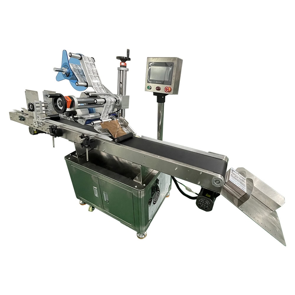 Adhesive labelling machine